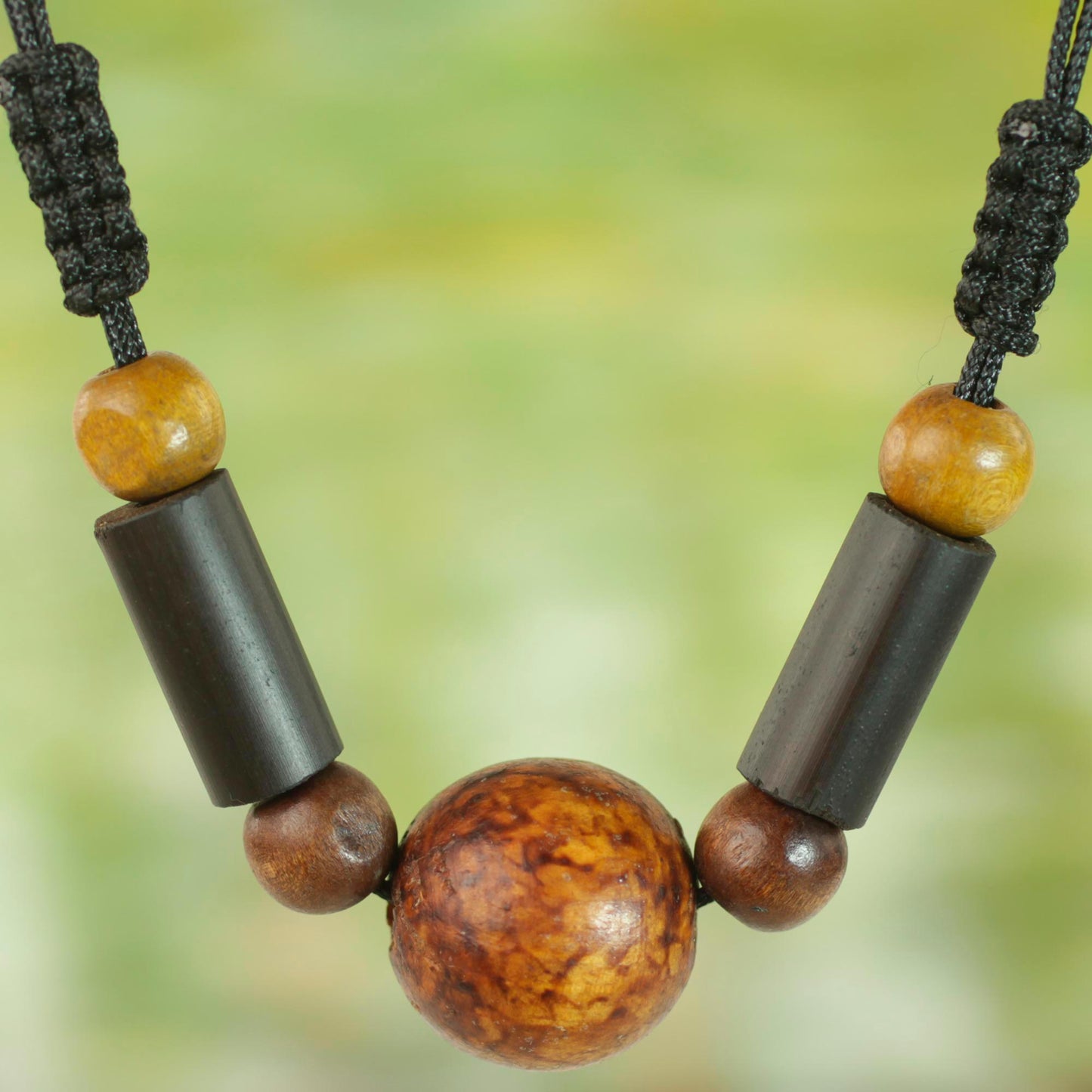 Round Might Sese Wood and Bamboo Cord Pendant Necklace from Ghana